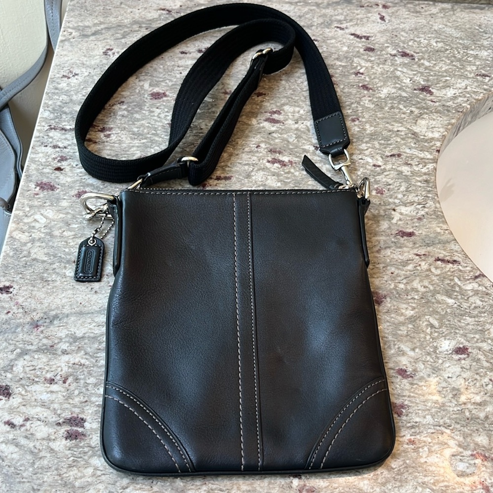 Coach black leather crossbody bag.